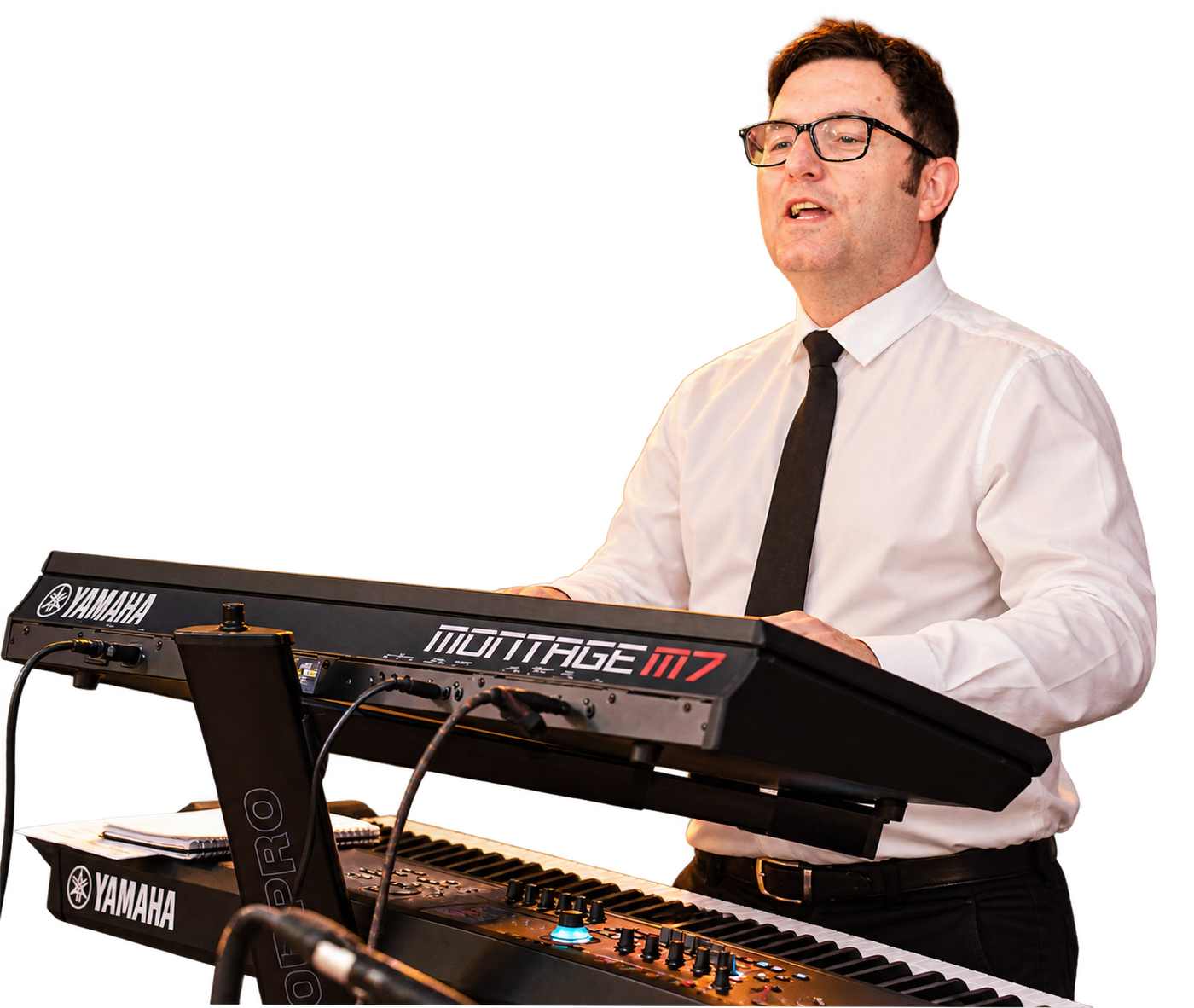 Jamie playing keys and singing